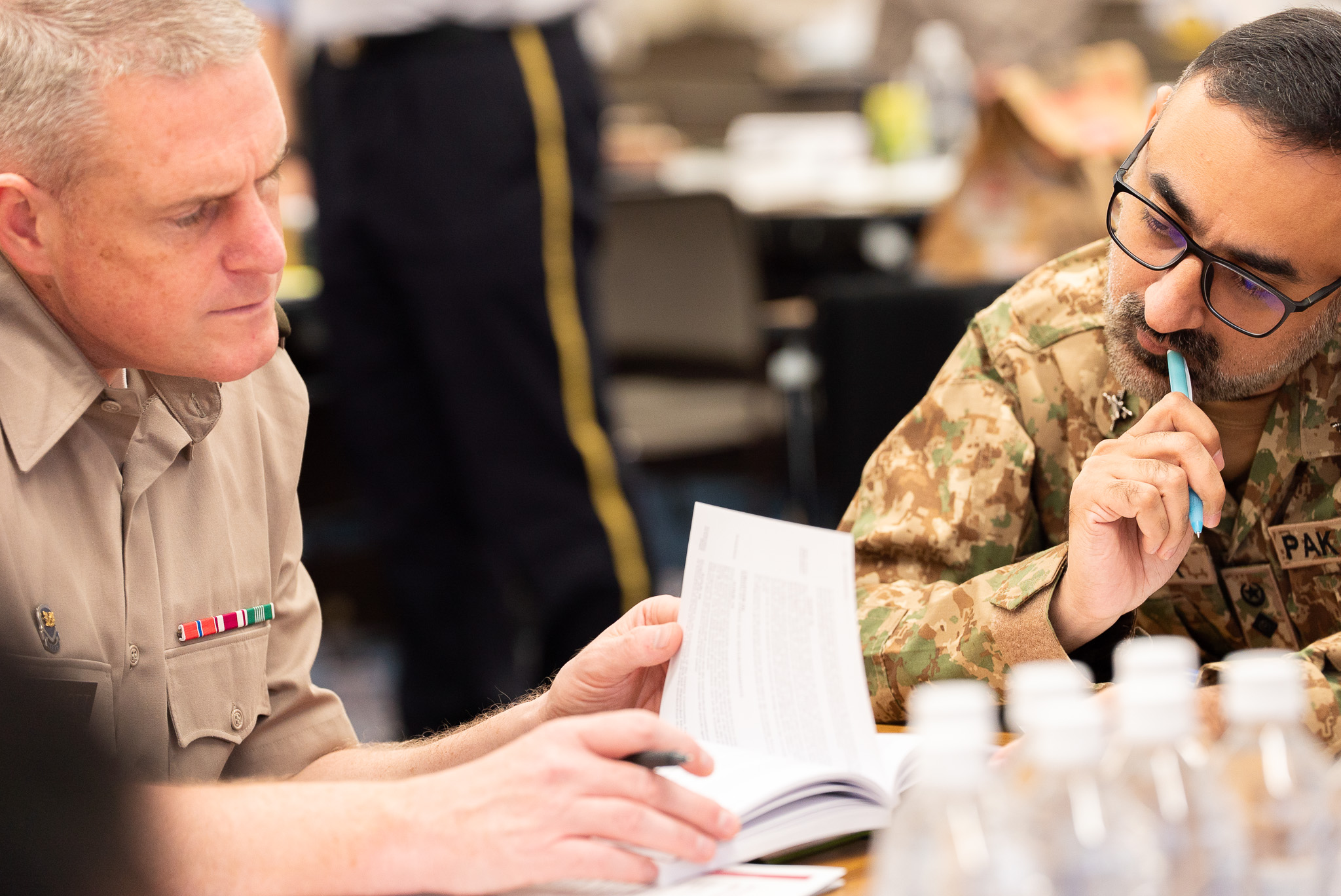 two persons discussing on the IHL topics